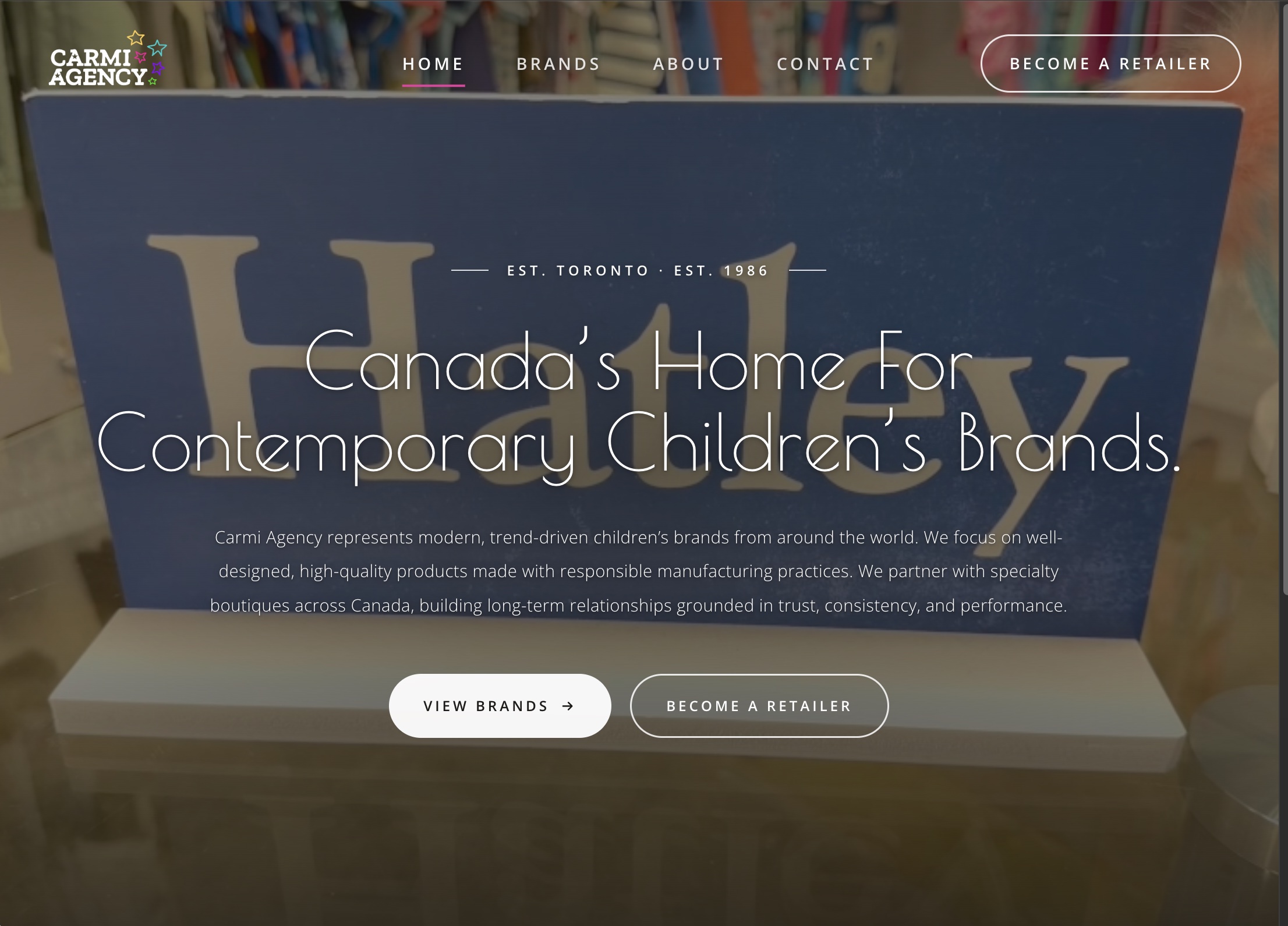 Carmi Agency homepage — playful art direction and editorial typography for a Toronto children's brand agency